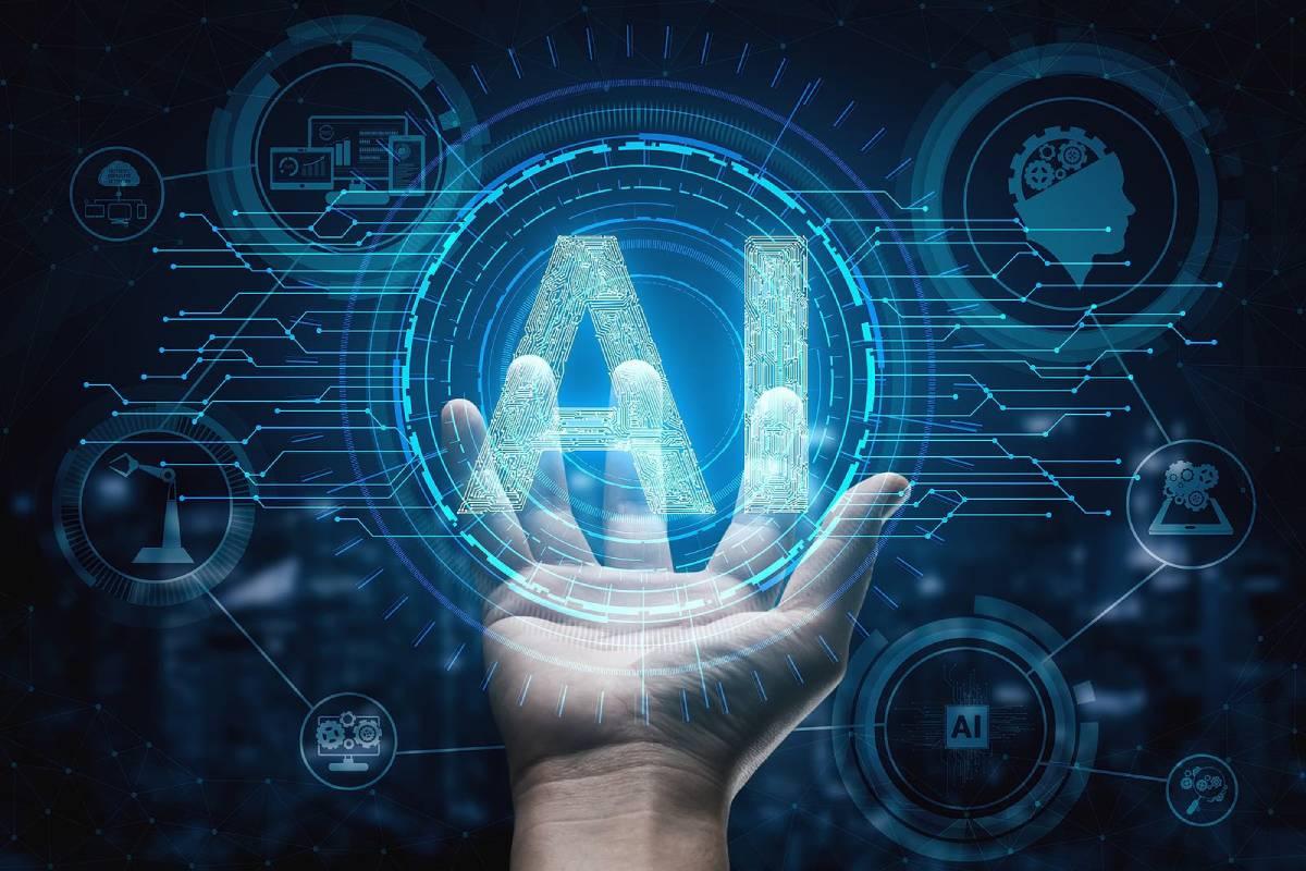 Hand holding digital AI letters