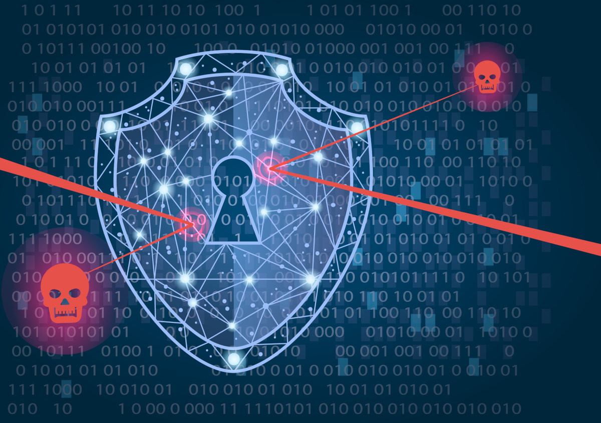 A shield in front of a background filled with binary code deflecting two red skulls to symbolize cybersecurity