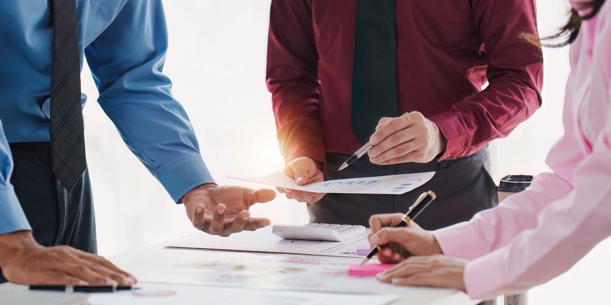 Business people loking at documents