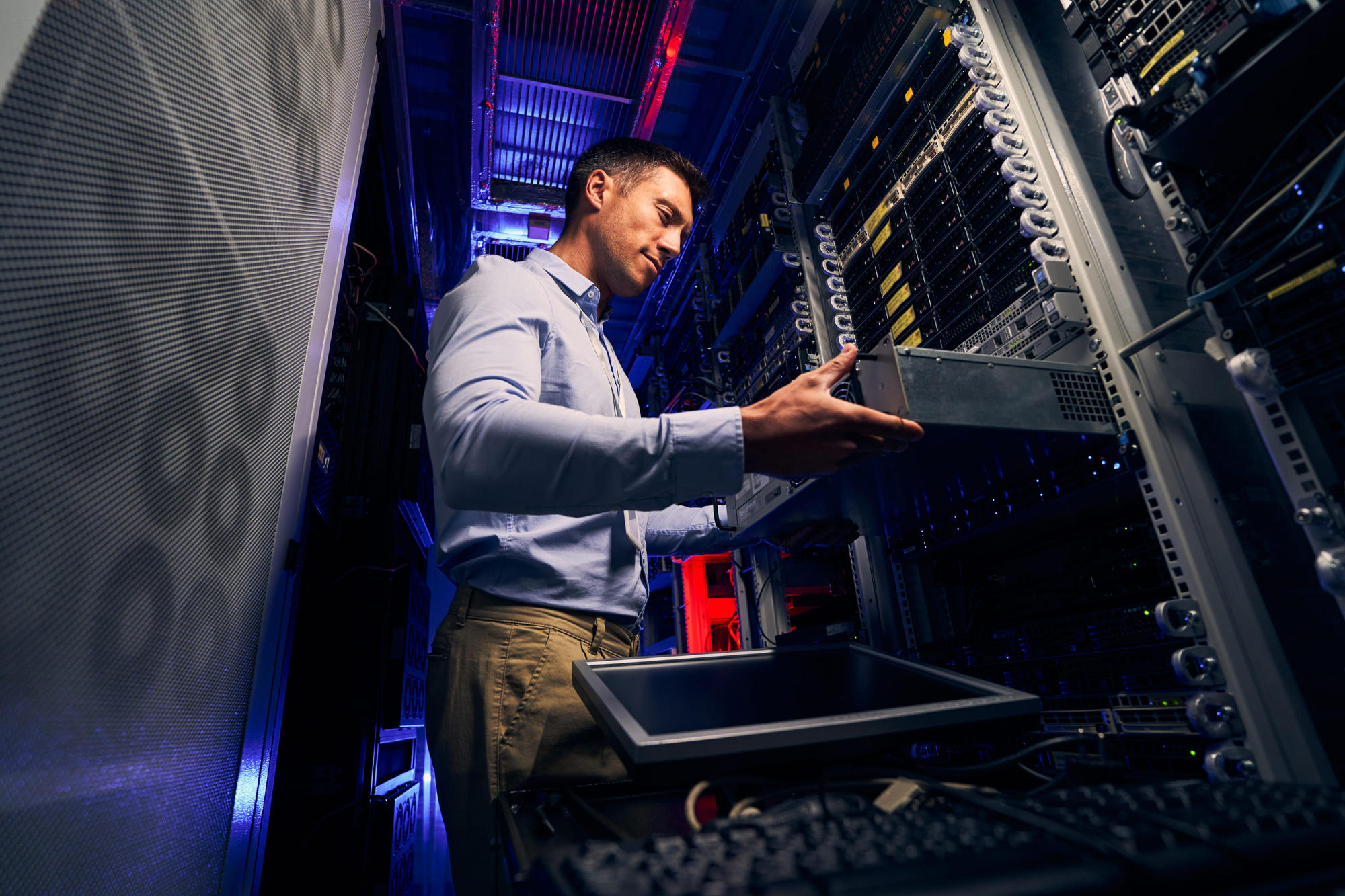 Engineer performing server equipment upgrade